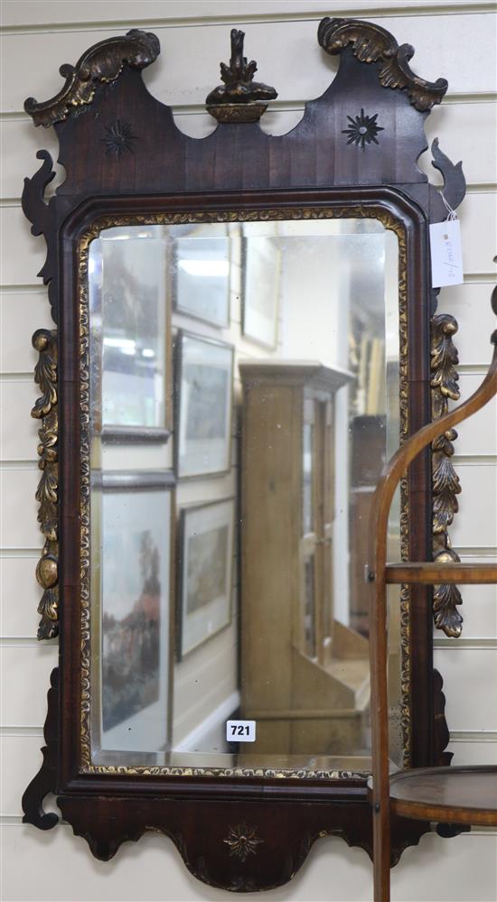 A George II red walnut and gilt wall mirror, H.95cm